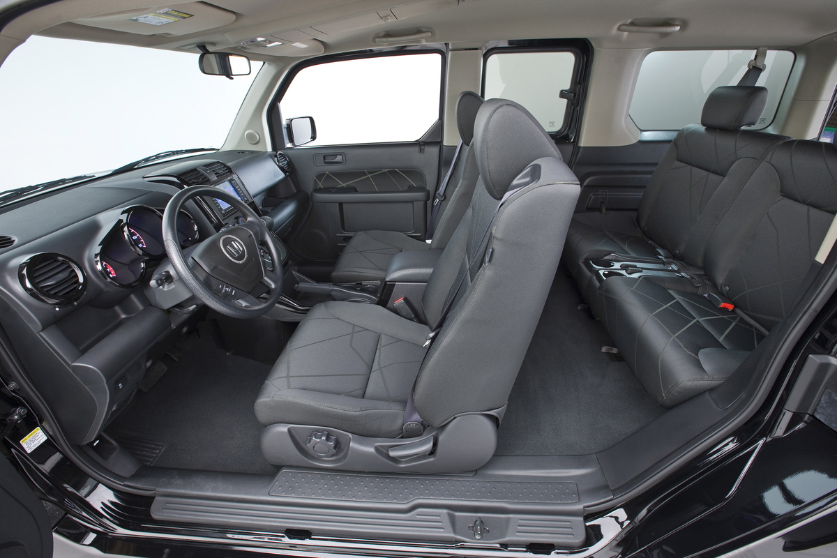2010 Honda Element SC rear cargo area and tailgate shown in an American Honda press image.