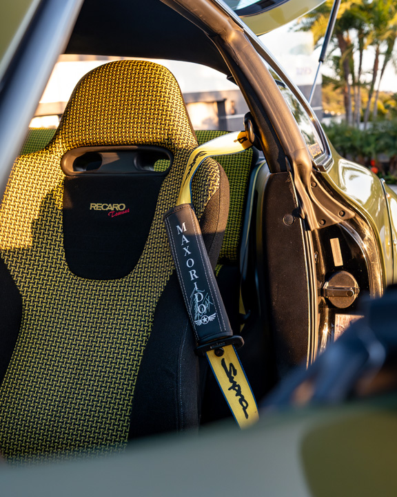 Close-up of the rare Recaro SP-JJ Tomcat Kevlar seat and Takata harness inside Leopold Barrit’s 1995 Toyota Supra.