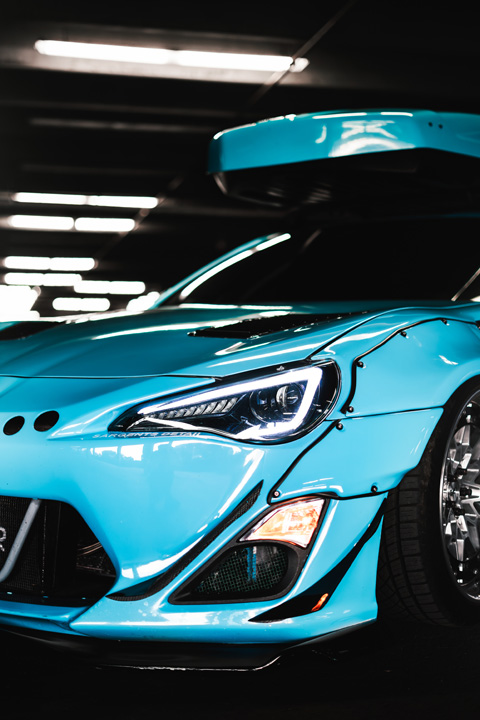 Nicholas Sargeant’s Rocket Bunny Scion FR-S shown from the front inside a parking garage.