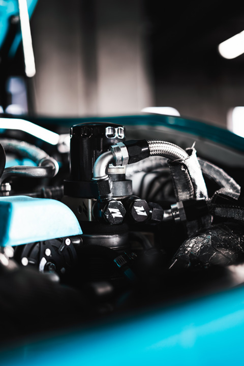 Aftermarket turbo and fluid system components inside the engine bay of Nicholas Sargeant’s 2016 Scion FR-S.