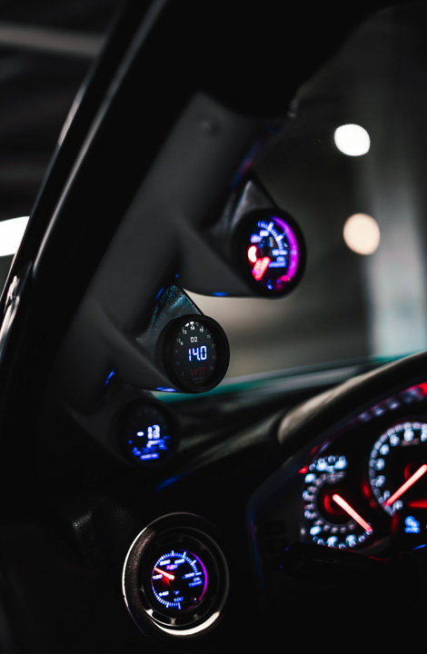 GlowShift gauges mounted along the A-pillar inside Nicholas Sargeant’s turbocharged Scion FR-S.