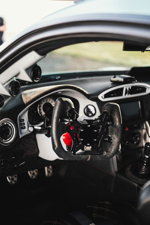 OMP GT/Formula 310 steering wheel and custom interior setup inside Nicholas Sargeant’s 2016 Scion FR-S.