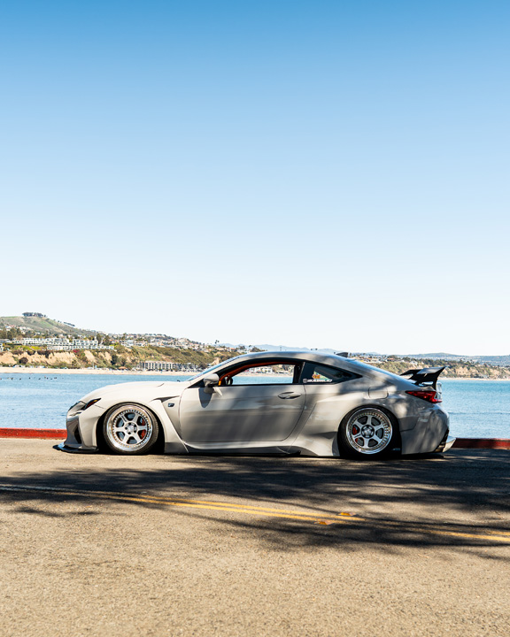 Dana Balthasar’s gray widebody Lexus RC F photographed along the coast.