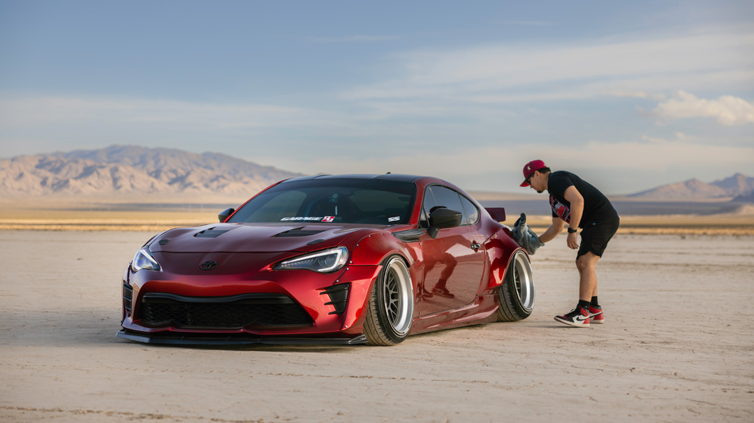 Anthony Gonzales’ red widebody Scion FR-S photographed in the desert.