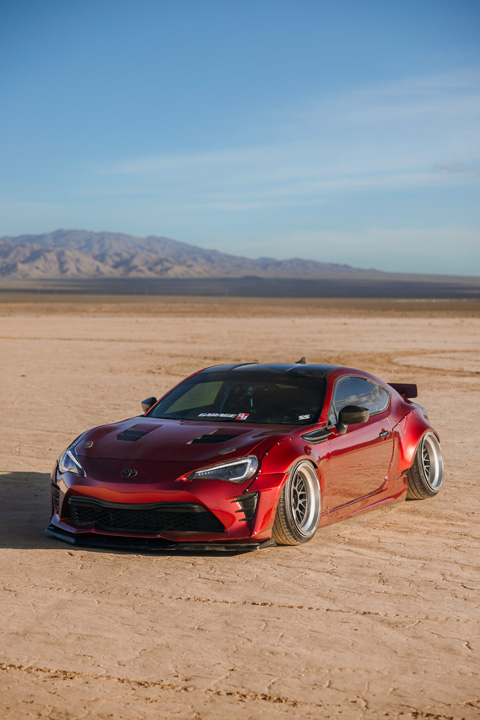 Anthony Gonzales’ red widebody Scion FR-S photographed in the desert.