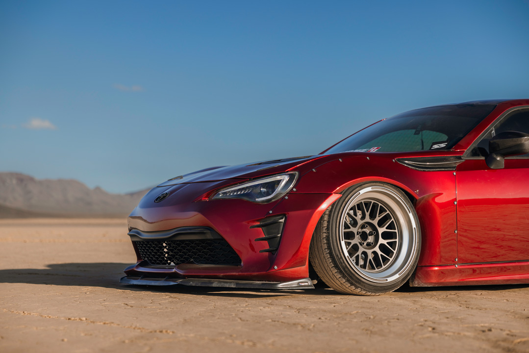 Anthony Gonzales’ red widebody Scion FR-S photographed in the desert.