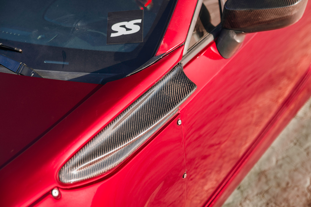 Anthony Gonzales’ red widebody Scion FR-S photographed in the desert.
