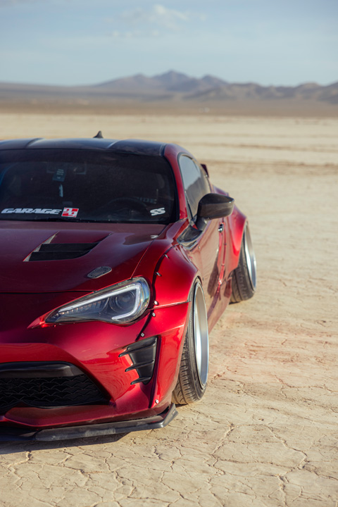 Anthony Gonzales’ red widebody Scion FR-S photographed in the desert.