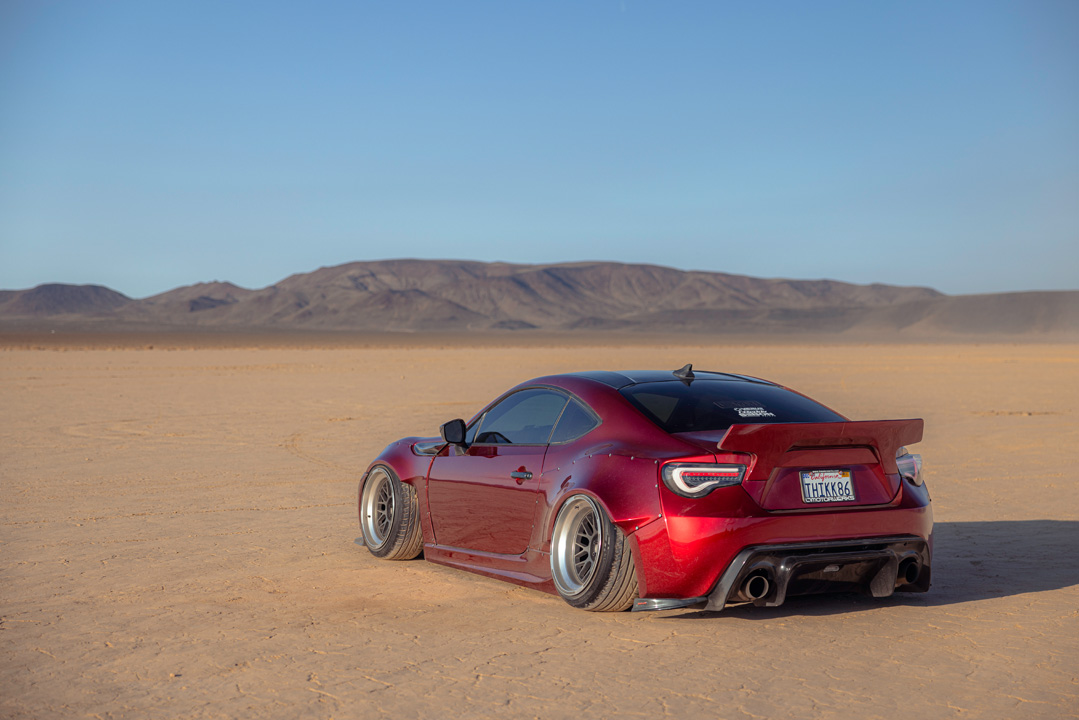 Anthony Gonzales’ red widebody Scion FR-S photographed in the desert.