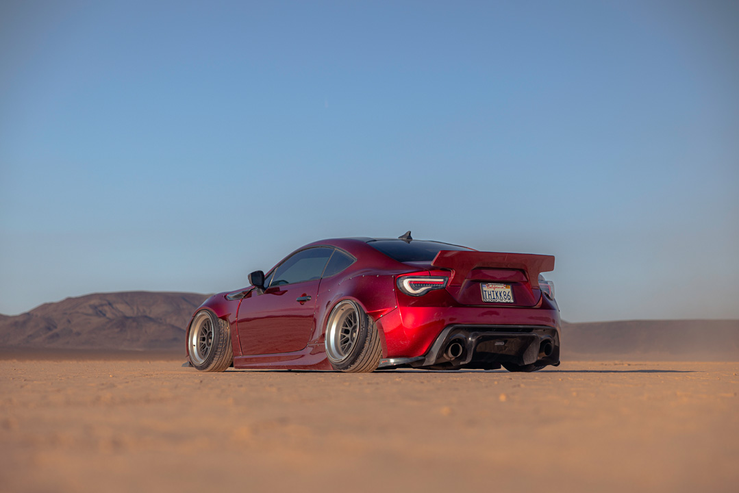 Anthony Gonzales’ red widebody Scion FR-S photographed in the desert.