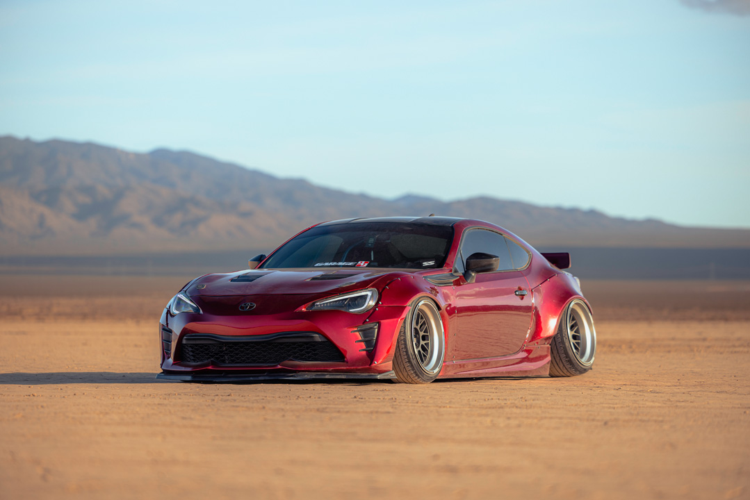 Anthony Gonzales’ red widebody Scion FR-S photographed in the desert.