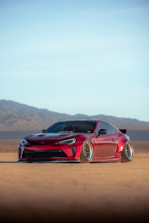 Anthony Gonzales’ red widebody Scion FR-S photographed in the desert.