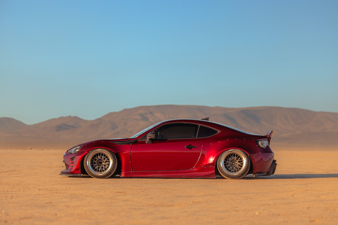 Anthony Gonzales’ red widebody Scion FR-S photographed in the desert.