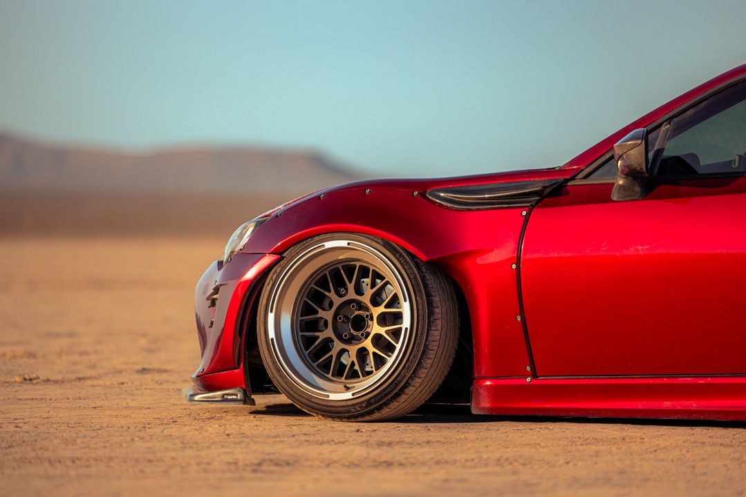 Anthony Gonzales’ red widebody Scion FR-S photographed in the desert.