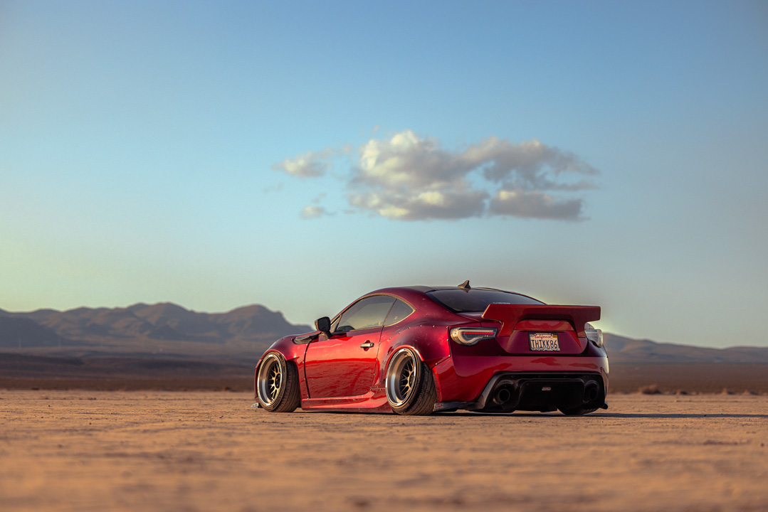 Anthony Gonzales’ red widebody Scion FR-S photographed in the desert.