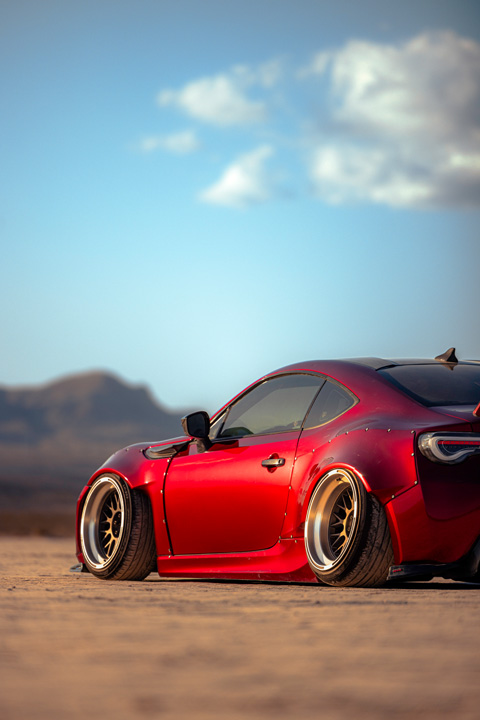 Anthony Gonzales’ red widebody Scion FR-S photographed in the desert.