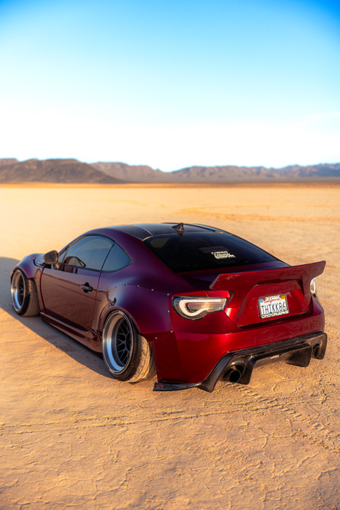 Anthony Gonzales’ red widebody Scion FR-S photographed in the desert.