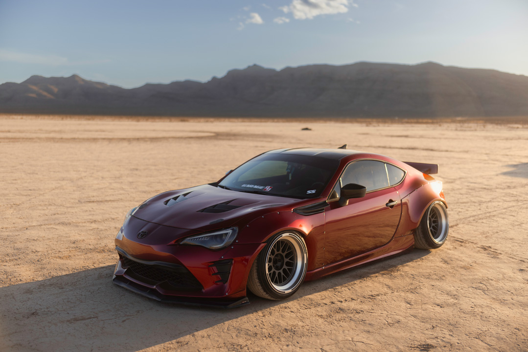 Anthony Gonzales’ red widebody Scion FR-S photographed in the desert.