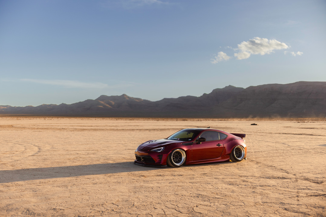 Anthony Gonzales’ red widebody Scion FR-S photographed in the desert.