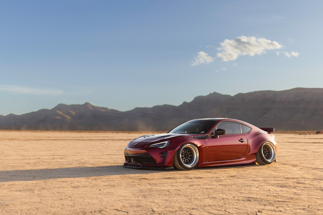 Anthony Gonzales’ red widebody Scion FR-S photographed in the desert.