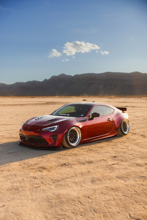 Anthony Gonzales’ red widebody Scion FR-S photographed in the desert.