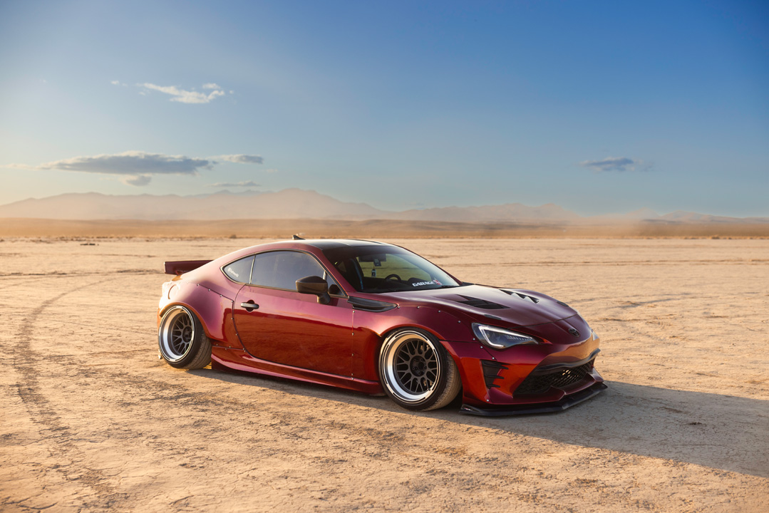 Anthony Gonzales’ red widebody Scion FR-S photographed in the desert.