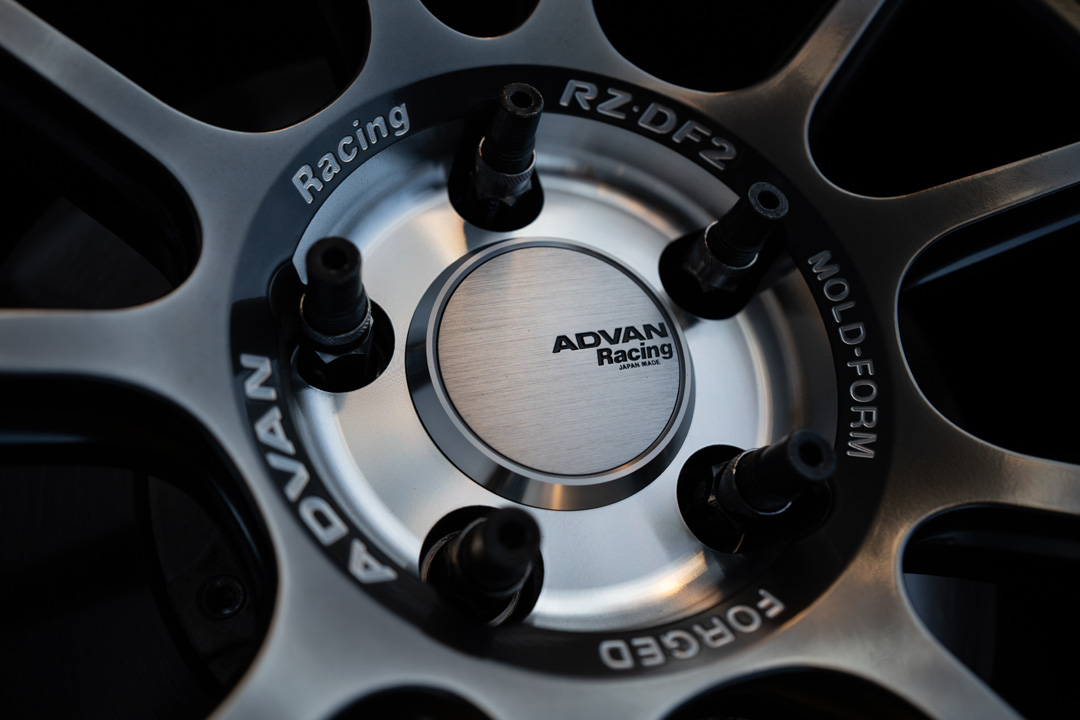 Close-up of the Advan Racing wheel center cap on Giuseppe Balthasar’s Lexus IS 500.