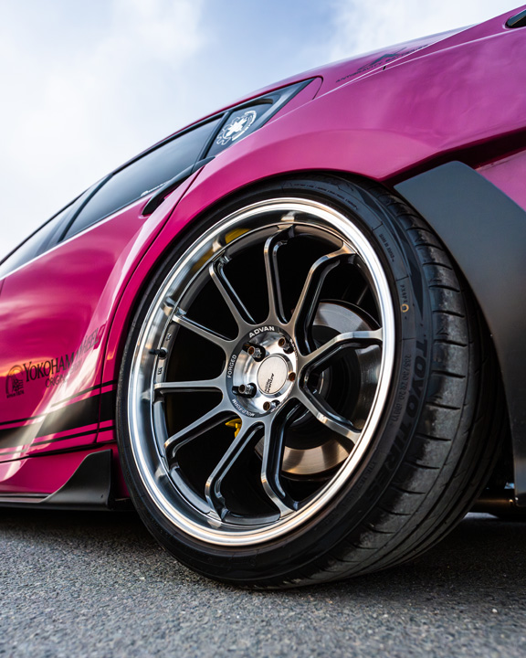 Low-angle wheel detail of Giuseppe Balthasar’s pink widebody Lexus IS 500.