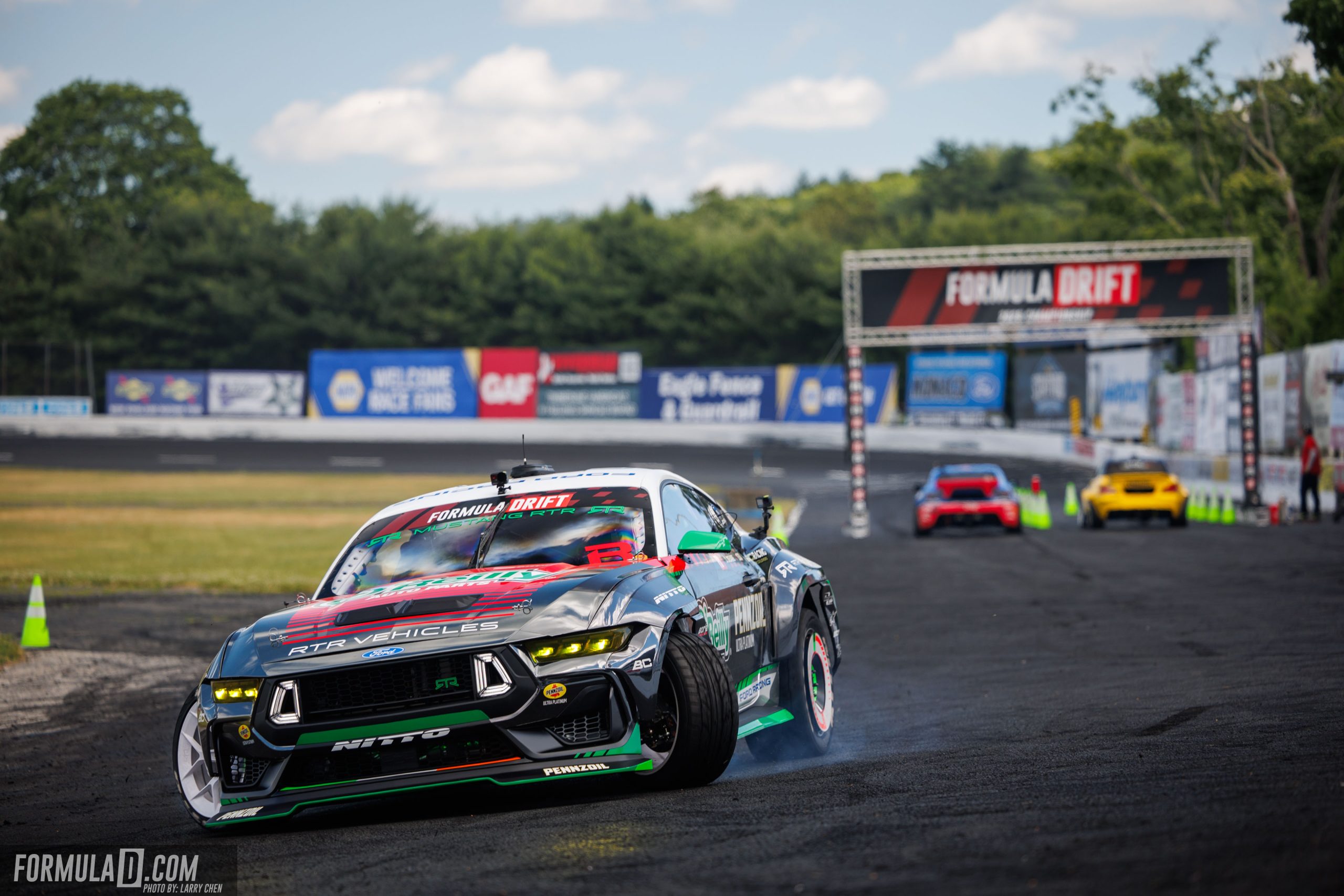 A Ford Mustang RTR drift car competes at Stafford Motor Speedway during Formula DRIFT PRO Round 4 in 2026.