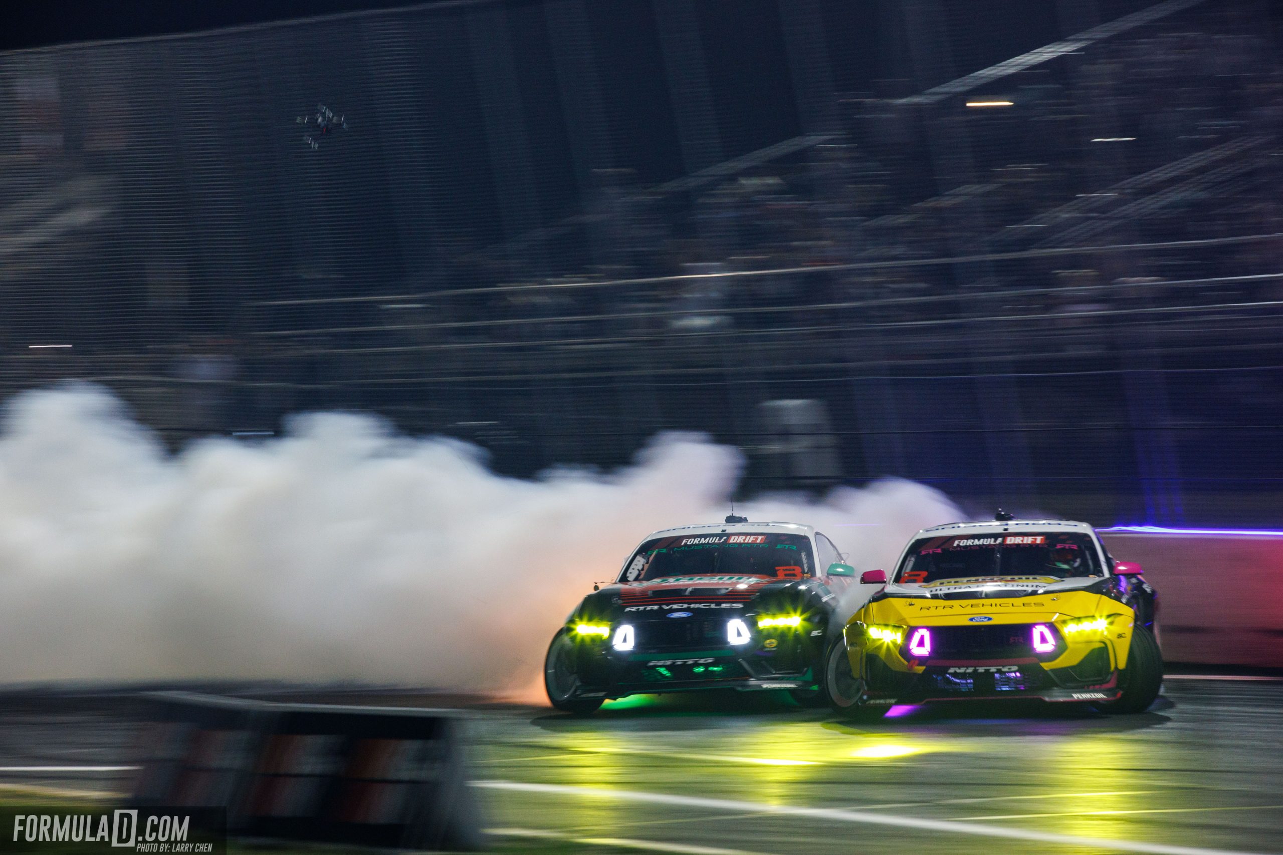 James Deane and Ben Hobson battle in their Ford Mustang RTR drift cars during Formula DRIFT PRO Round 4 at Stafford Motor Speedway in 2026.