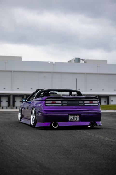 Alex Hammond’s purple 1993 Nissan 300ZX Convertible with carbon-fiber details, custom aero, low stance, and detailed interior upgrades.
