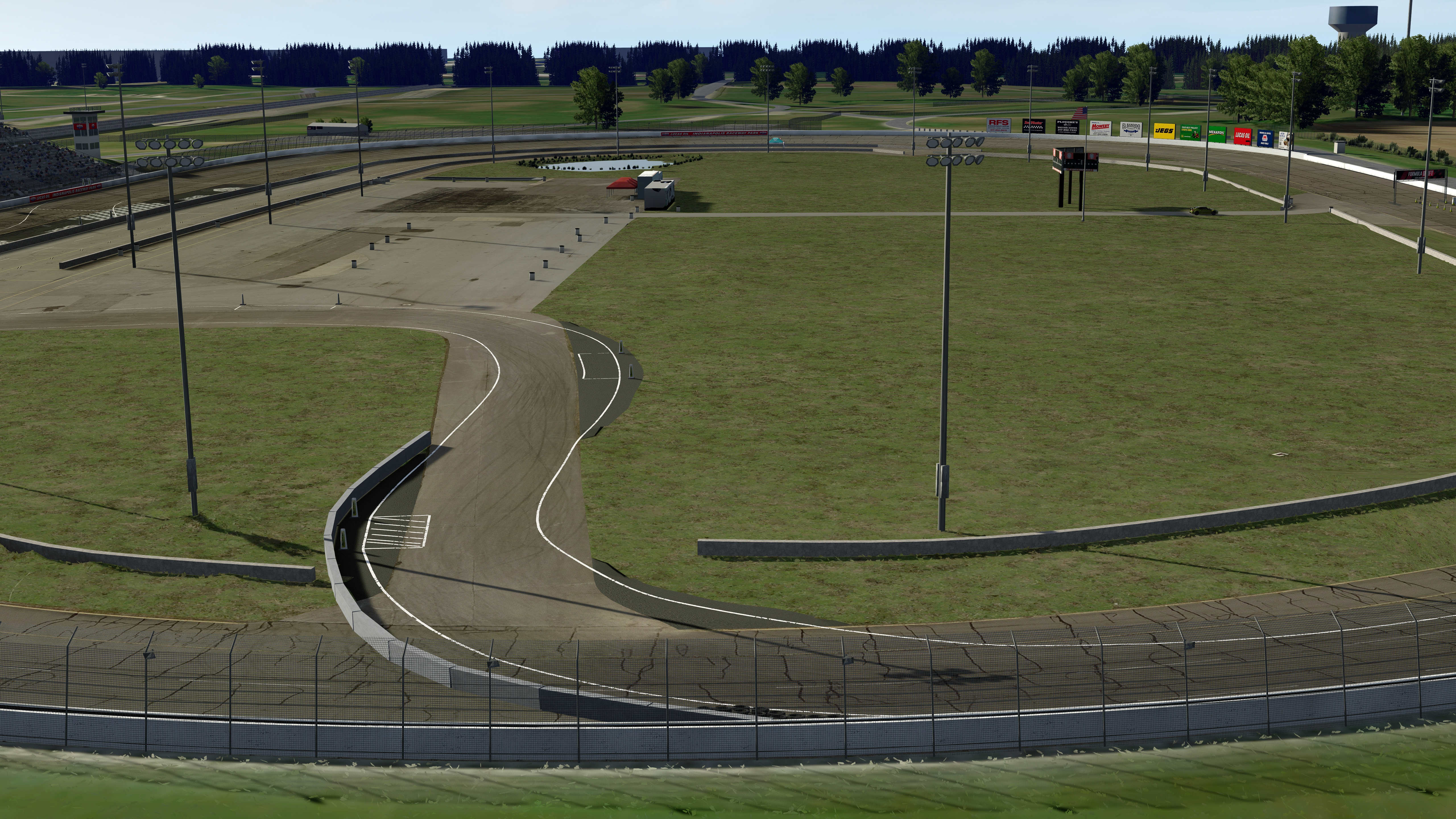 Rendering of the revised Formula DRIFT Indianapolis Raceway Park course showing new pavement sections and track barriers from an elevated view.