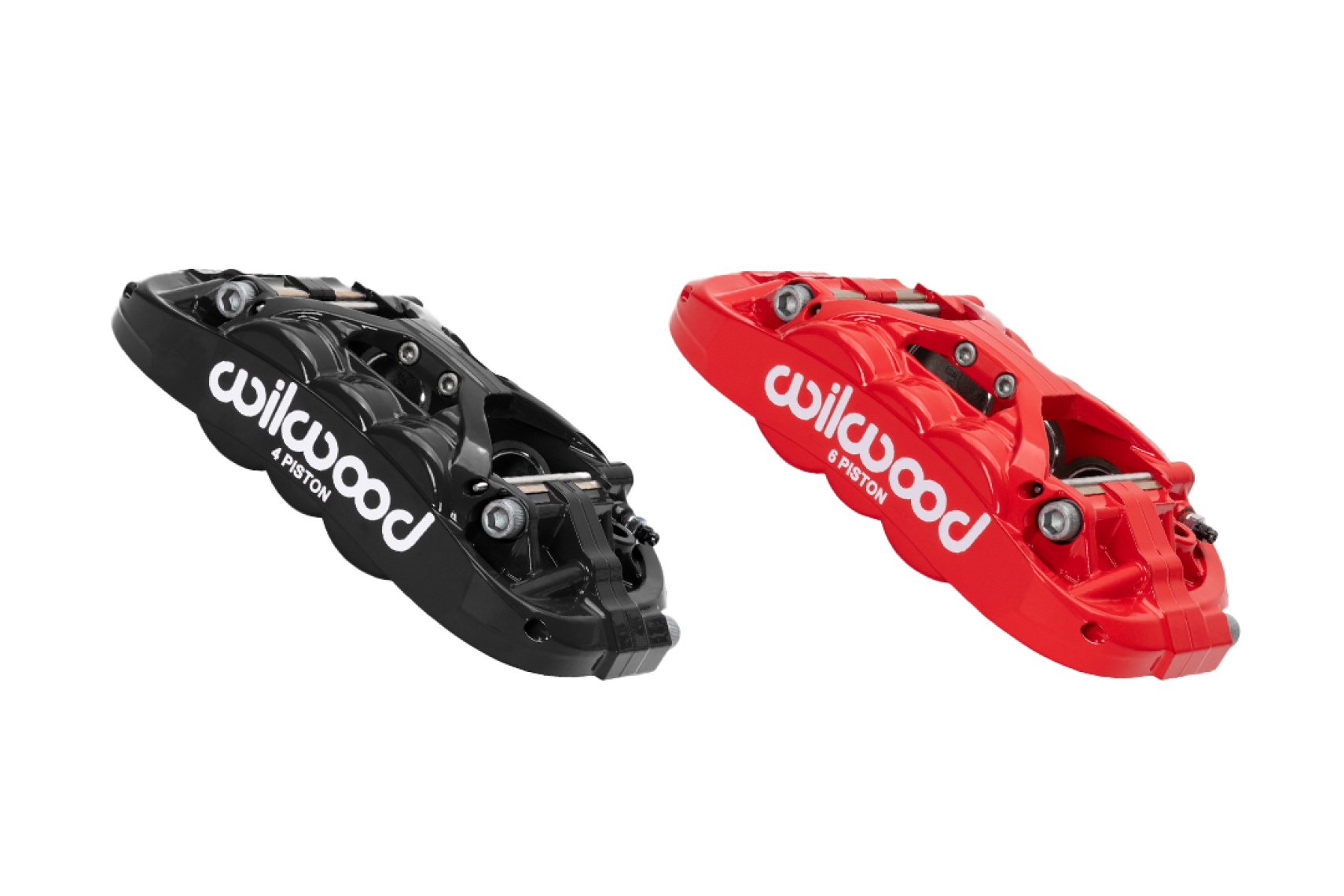 Wilwood XRS six-piston high-performance street calipers shown in gloss black and gloss red.