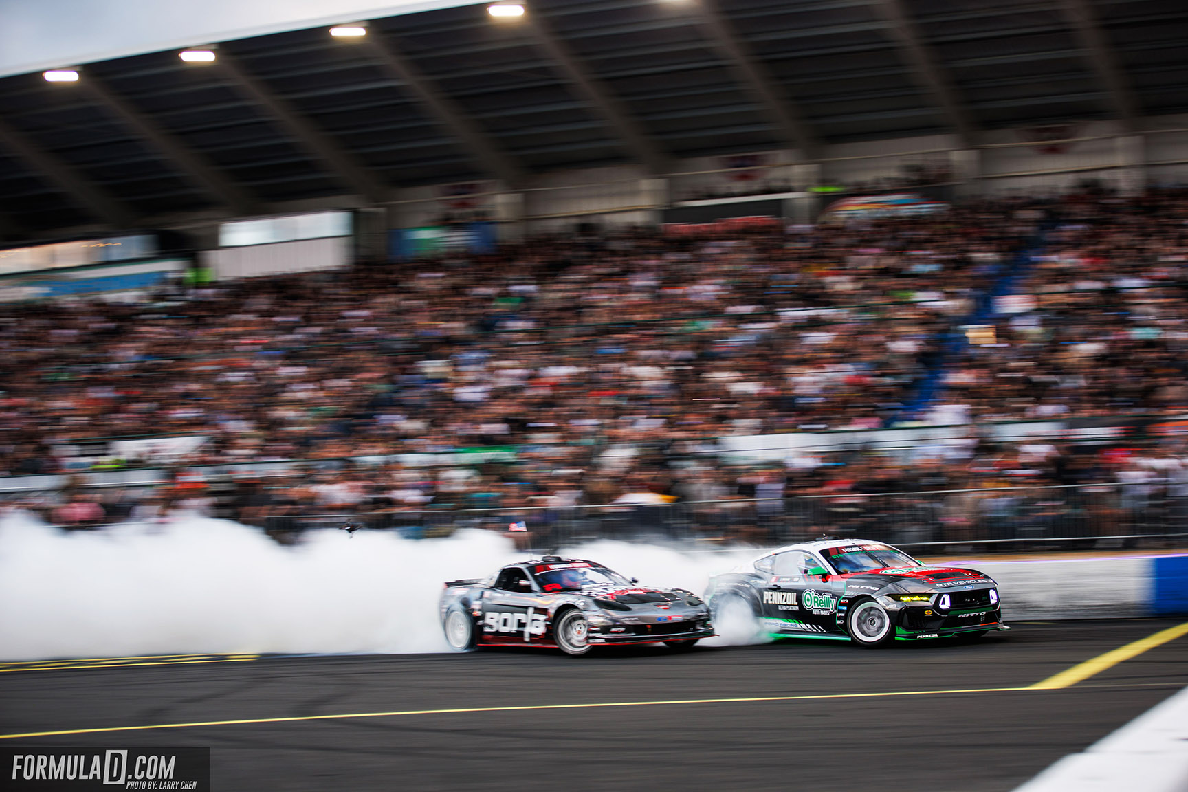 Matt Field battles James Deane during the Formula DRIFT PRO Round 6 Top 16 at Evergreen Speedway in 2026.