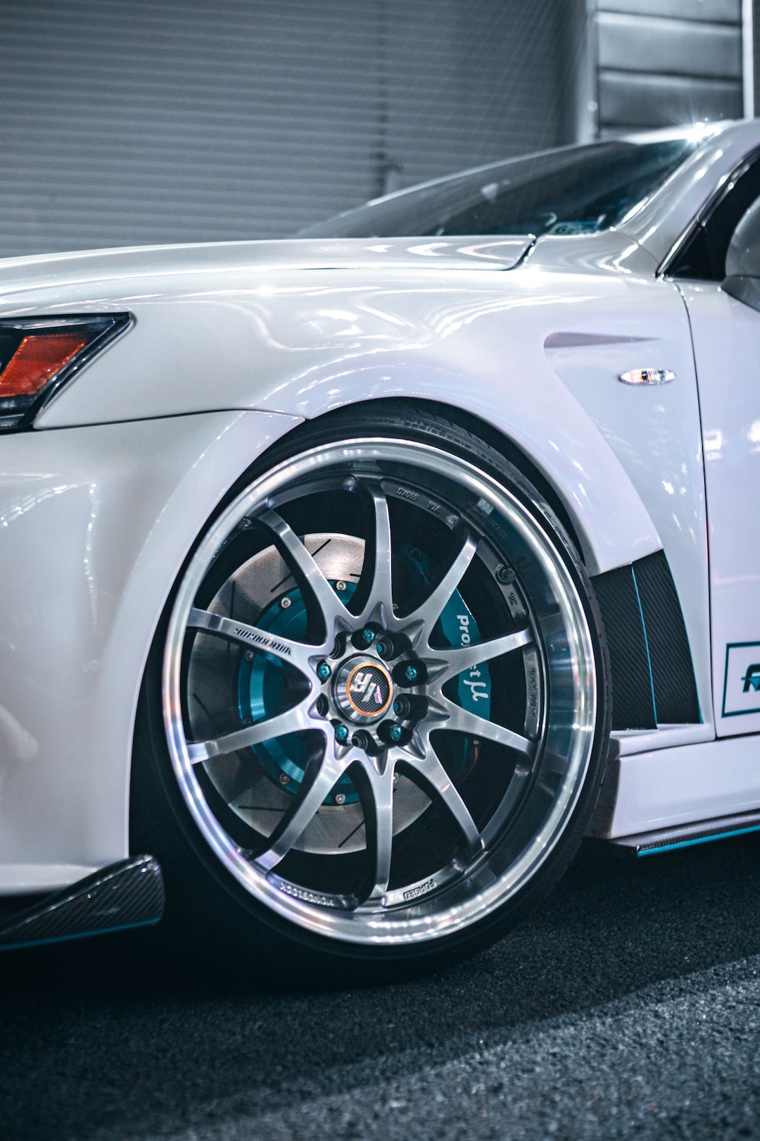 Close-up of a Volk Racing LE28N wheel and Project Mu big brake kit on Harry Nguyen’s 2006 Lexus IS350.