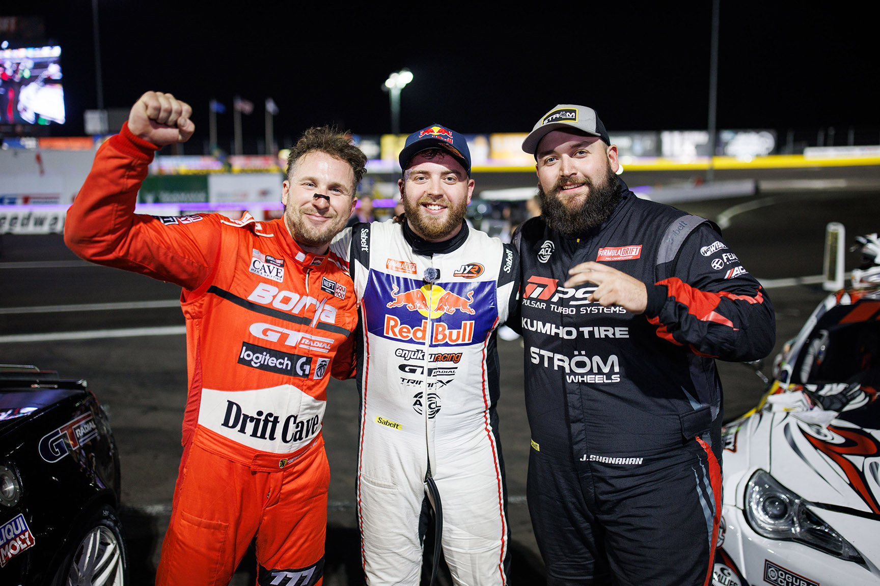 Formula Drift Round 7 podium finishers Matt Field, Conor Shanahan and Jack Shanahan at Las Vegas Motor Speedway.