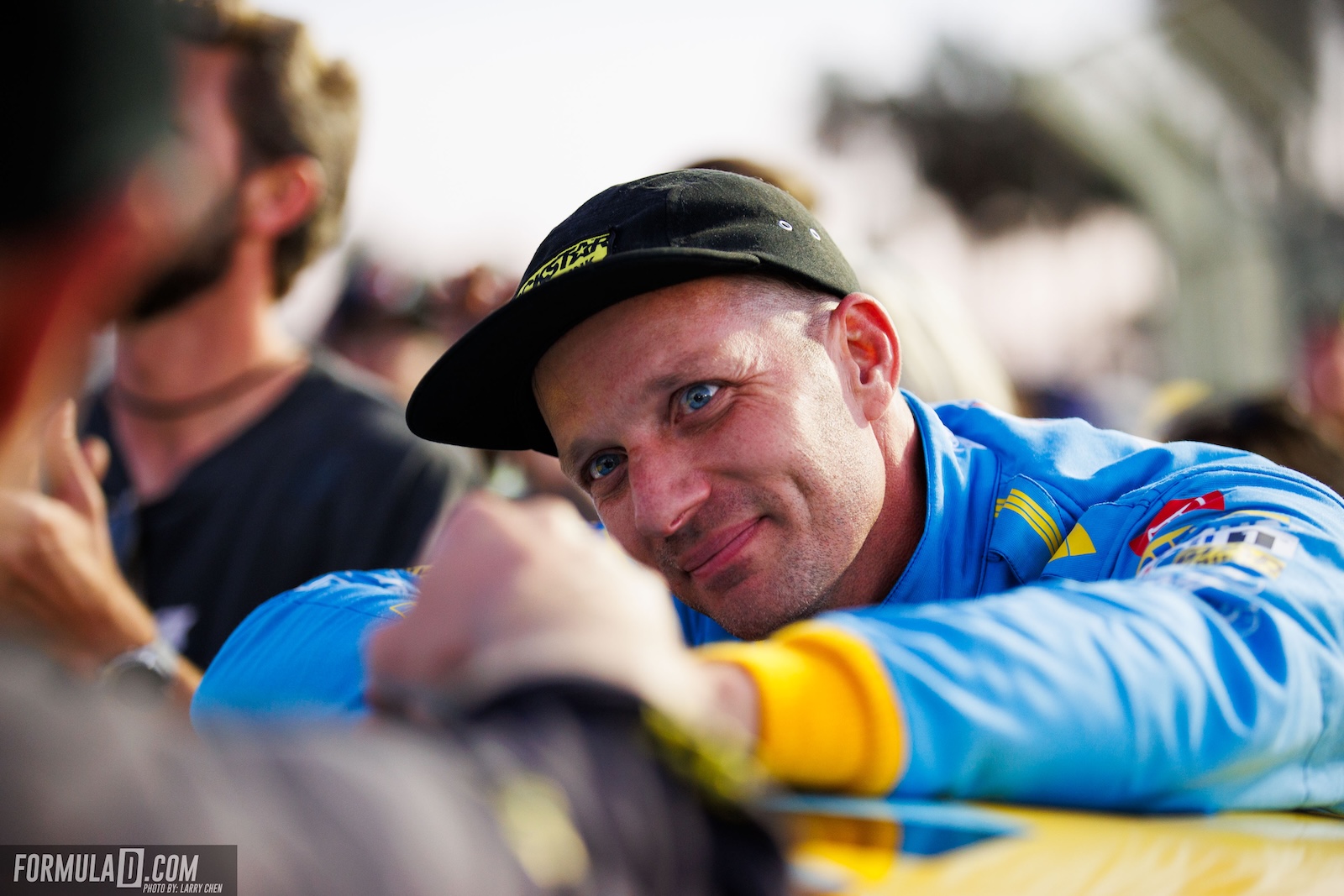Ryan Tuerck smiles while interacting with fans during his final Formula Drift appearance at the 2026 season finale in Long Beach, California.